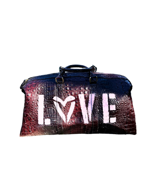 LOVE Duffle in burgundy and navy croc-embossed vegan leather with white hand-stenciled LOVE lettering, front view
