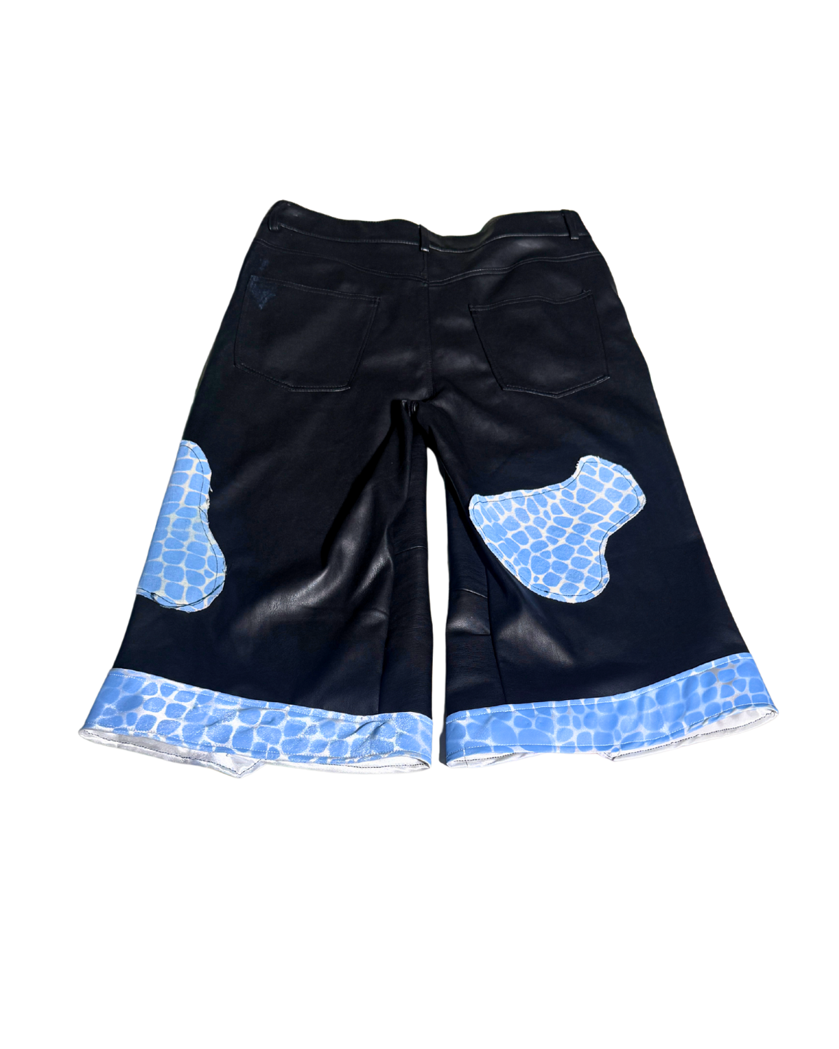 Rockstar Sw@g black wide-leg pants with blue patches, back, 1-of-1 NYFW SS27 by RICHOUTHEBOX